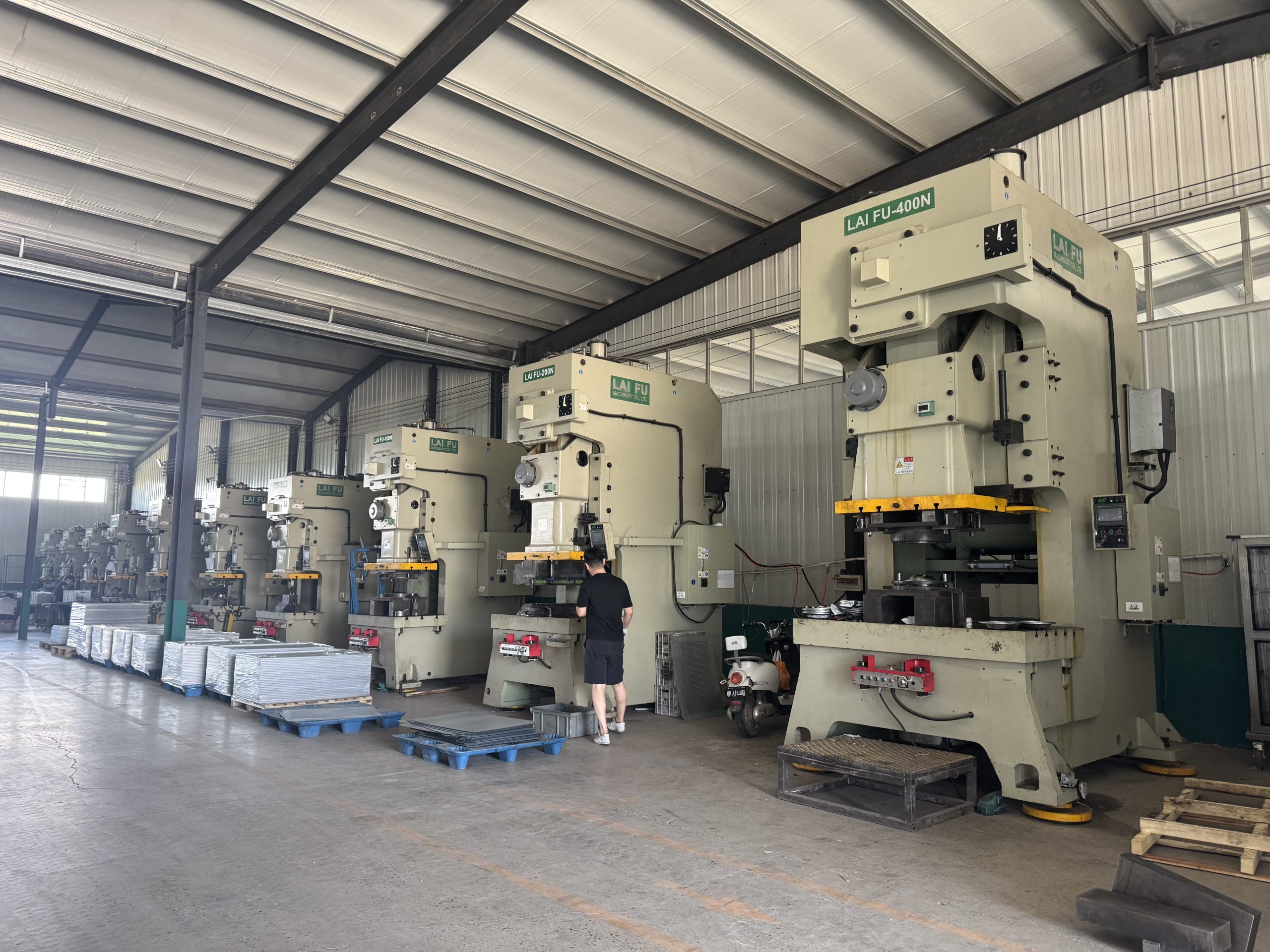 our stamping line with stainless steel sheet staged beside the presses