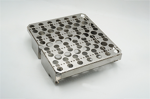 the same 304 stainless assembly from the other side, showing welded flanges and mounting studs